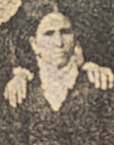 Abigail Perry Bickford seated in a dark dress, from a printed family group