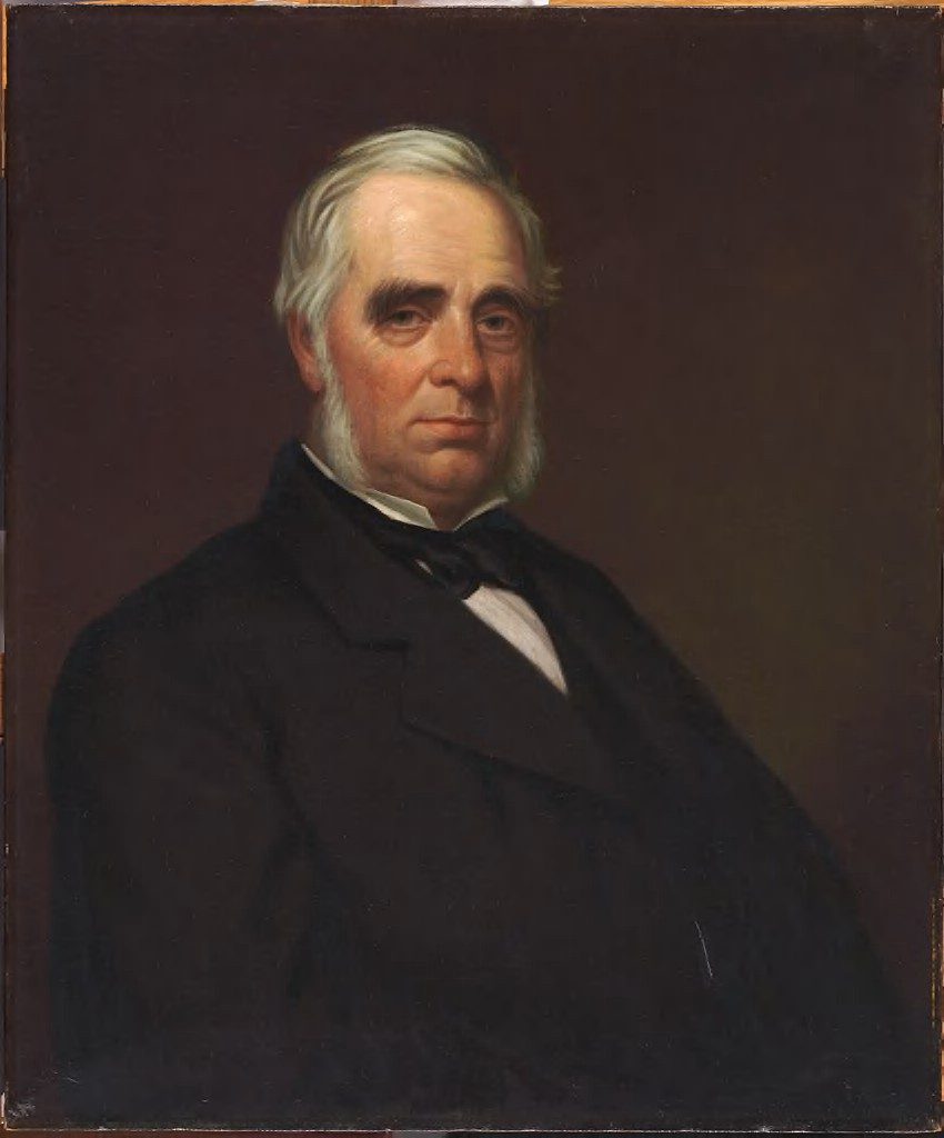 Portrait of a gray-haired man with side whiskers, in a dark coat and white shirt
