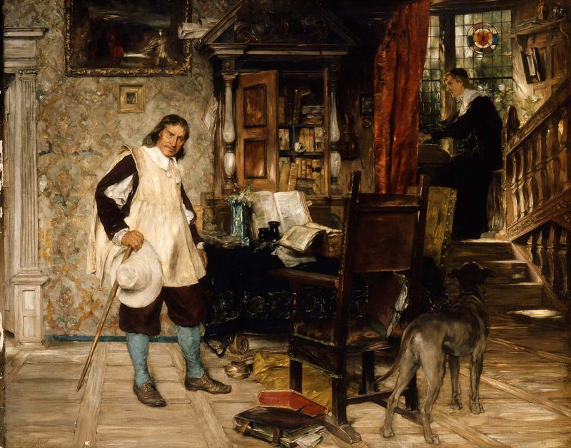 A man in a broad hat and boots stands in a book-filled room where another man plays an organ