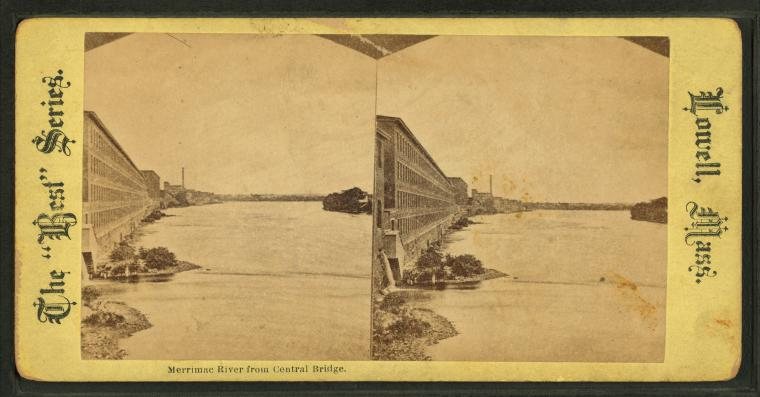 Stereograph of the river with long mill buildings along the left bank